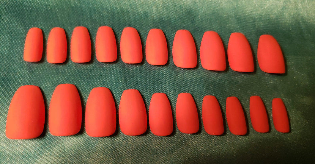 Orange matte press on nails.