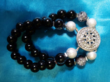 Load image into Gallery viewer, Black and silver double-strand bracelet with crystal focal point.
