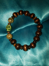 Load image into Gallery viewer, Wooden beads with jasper and green ceramic skull bracelet.
