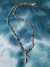 Load image into Gallery viewer, Blue glass bead necklace with crystal cross pendant.
